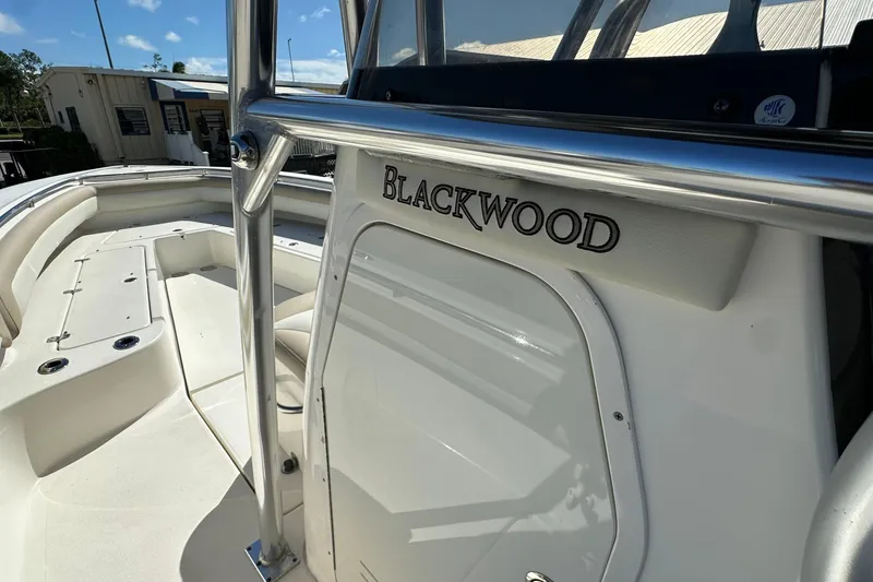 Slide: The Image of 2012 Blackwood 270 boat interior with seating and stainless steel details. - 13