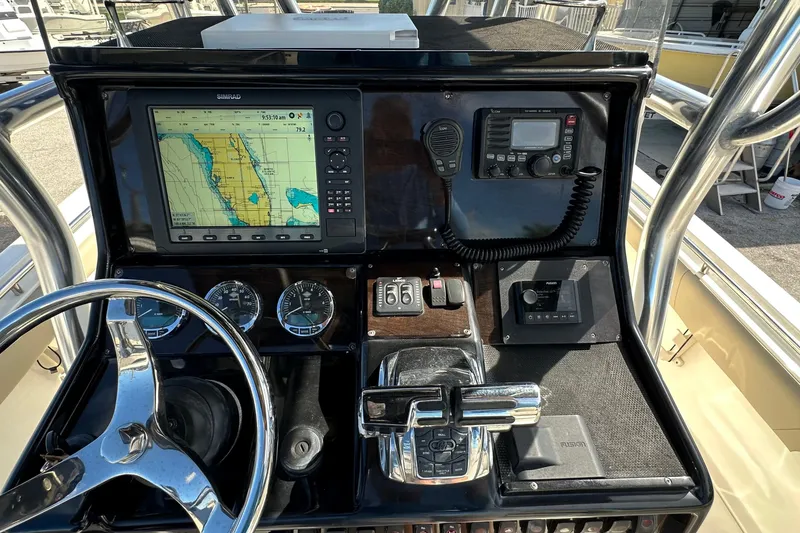 Slide: The Image of Control panel of a 2012 Blackwood 270 boat with navigation and communication equipment. - 4