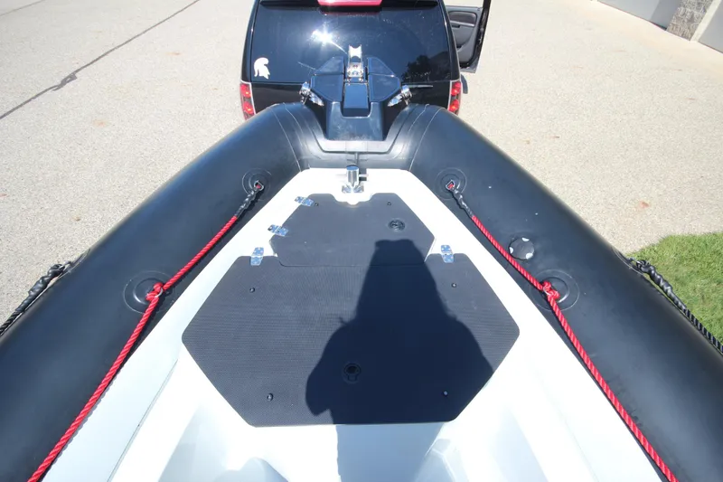 Slide: The Image of 2018 Zodiac Open 7 NEO boat on trailer, viewed from above, with red ropes. - 19