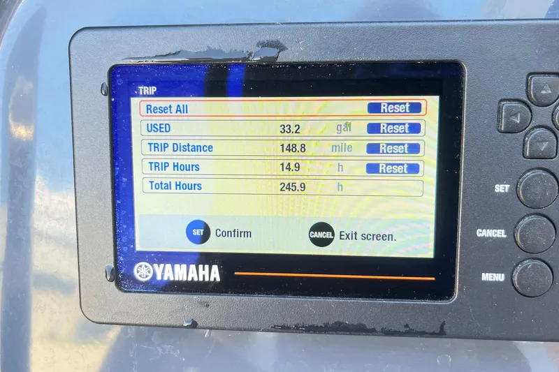 Slide: The Image of Yamaha display showing trip data: 33.2 gallons used, 148.8 miles, 14.9 trip hours. - 32