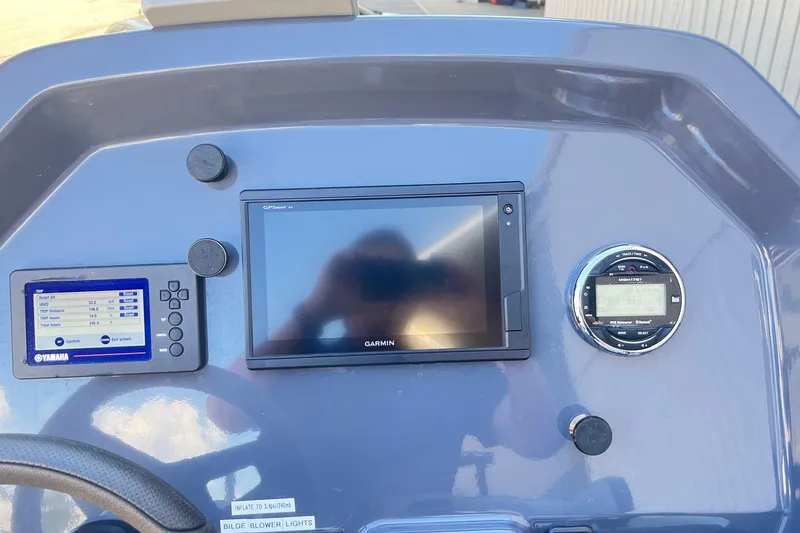 Slide: The Image of Dashboard of 2018 Zodiac Open 7 NEO with Garmin and Yamaha displays. - 34