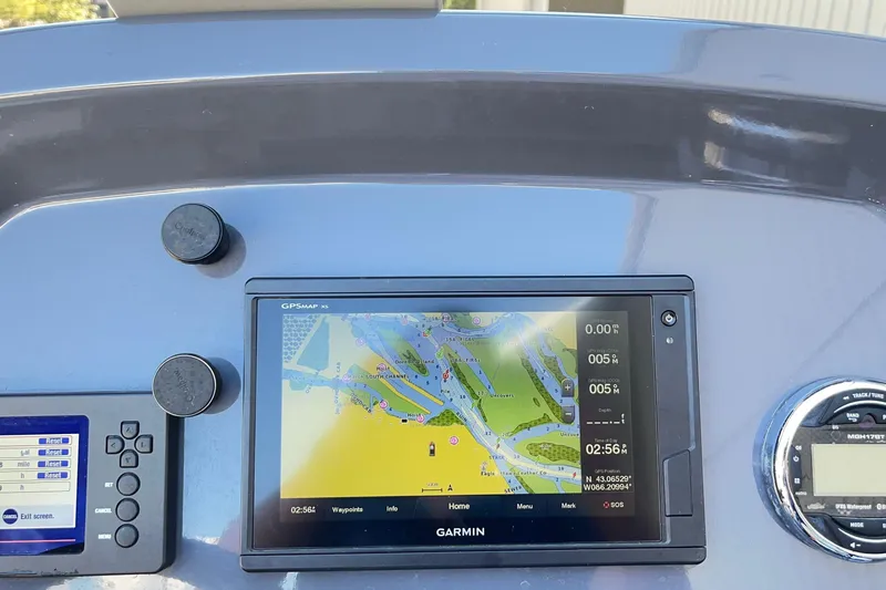 Slide: The Image of Dashboard of 2018 Zodiac Open 7 NEO with Garmin GPS navigation system. - 33