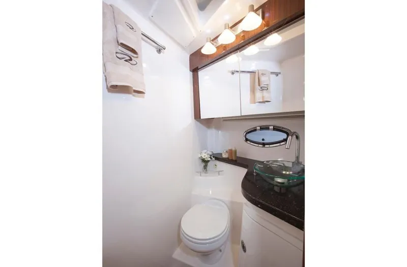 Slide: The Image of 2014 Regal 42 Sport Coupe bathroom with modern fixtures and elegant design. - 27