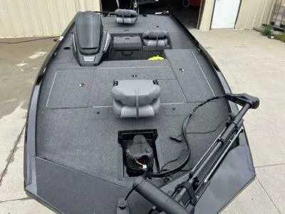 Slide: The Image of 2025 Lowe Stinger 175 Crappie boat with spacious deck and seating. - 5