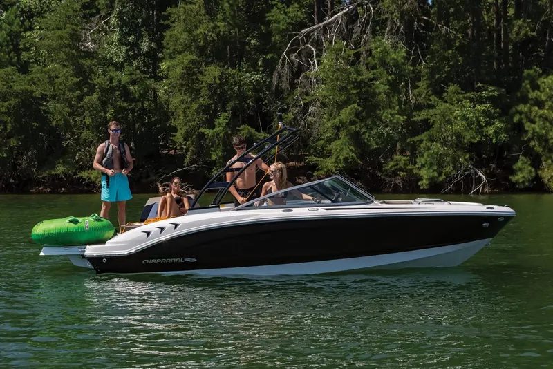 Slide: The Image of 2026 Chaparral 21 SSi boat interior with sleek seating and modern dashboard. - 4