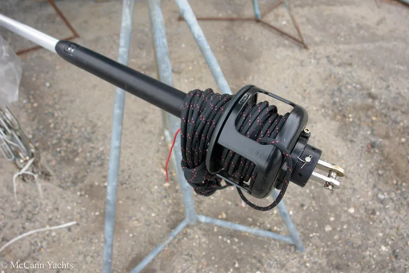 Slide: The Image of 1984 Sabre 32 Aft-Cabin yacht mast with coiled rope on deck. - 20