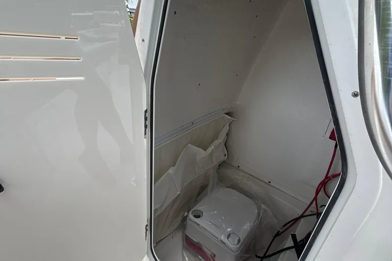 Slide: The Image of Interior view of 2026 Key West 239 FS boat storage compartment. - 11