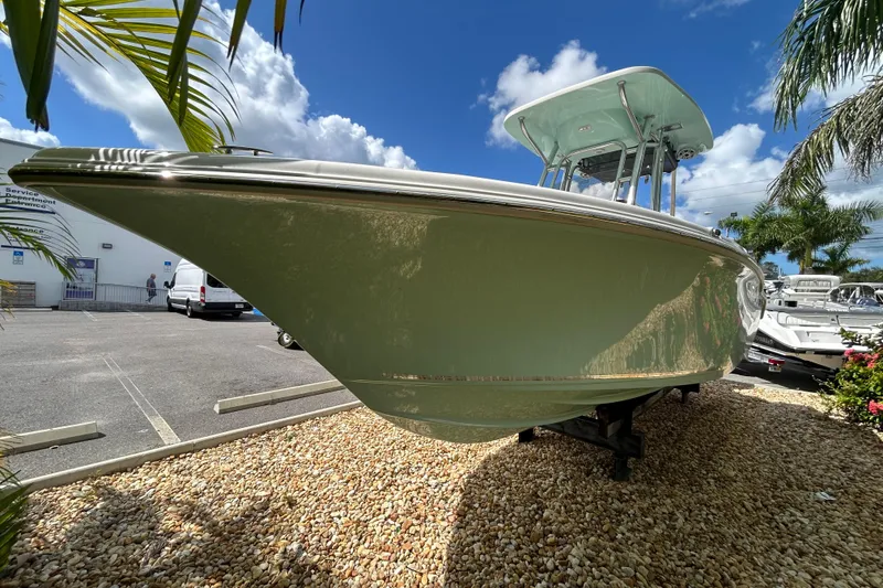 Slide: The Image of 2026 Key West 239 FS boat displayed outdoors under a clear blue sky. - 5