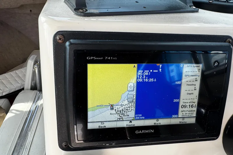 Slide: The Image of Garmin GPS display on 2007 Parker 2320 SL Sport Cabin boat dashboard. - 11