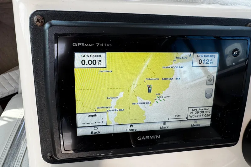 Slide: The Image of Garmin GPS display on 2007 Parker 2320 SL Sport Cabin, showing map and navigation details. - 12