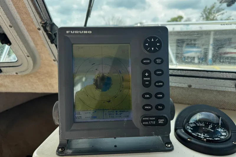 Slide: The Image of Furuno marine radar display inside 2007 Parker 2320 SL Sport Cabin boat. - 15