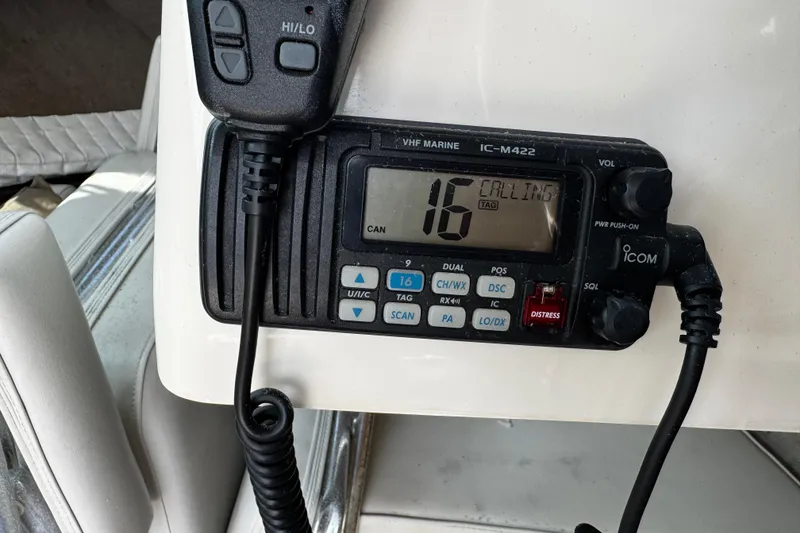 Slide: The Image of VHF marine radio on 2007 Parker 2320 SL Sport Cabin, channel 16 active. - 9