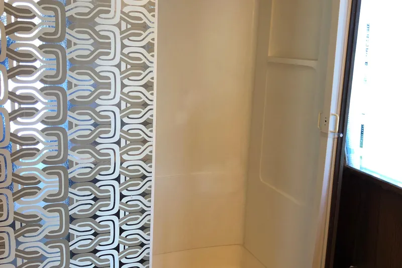 Slide: The Image of Shower area with patterned glass door on 1977 Pluckebaum Baymaster 52 yacht. - 22