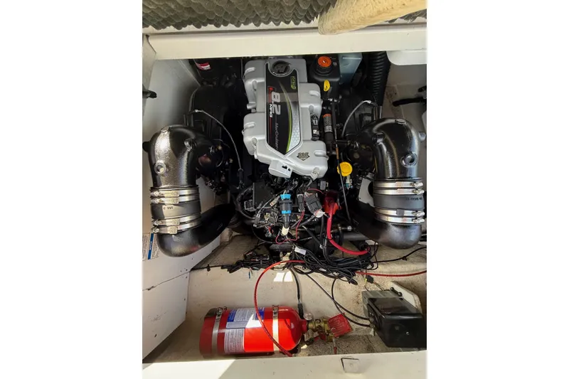 Slide: The Image of Engine compartment of a 2016 Sea Ray 270 Sundeck with visible fire extinguisher. - 22