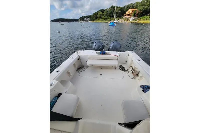 Slide: The Image of 2007 Pursuit OS 335 Offshore boat interior with scenic waterfront view. - 12