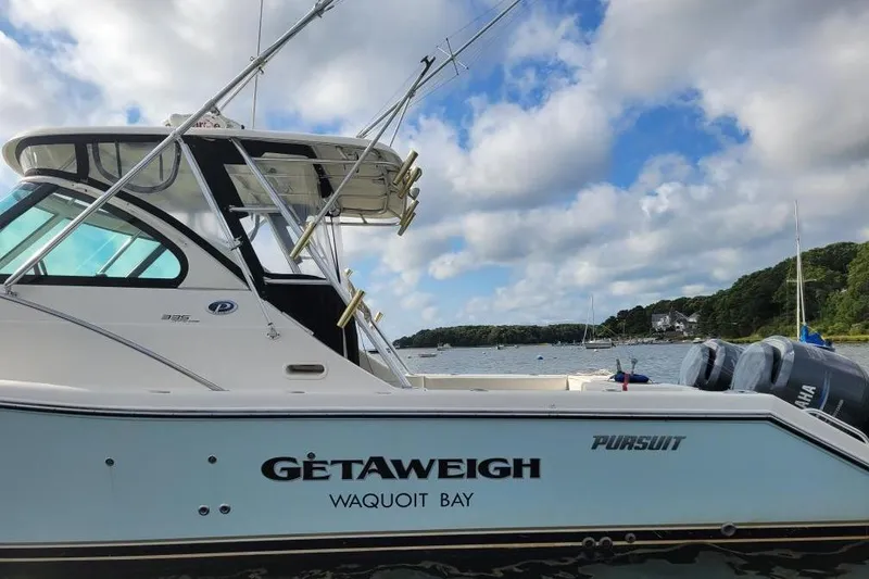 Slide: The Image of 2007 Pursuit OS 335 Offshore boat named "Getaweigh" docked at Waquoit Bay. - 4