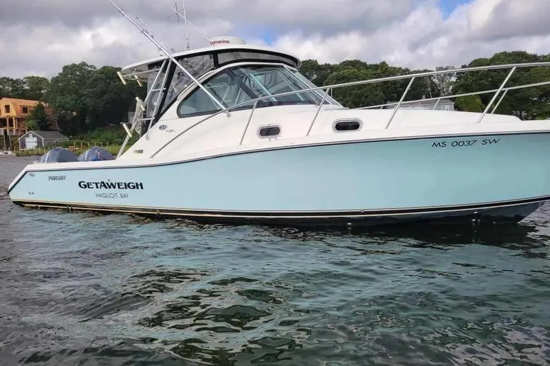 Slide: The Image of 2007 Pursuit OS 335 Offshore boat on water, side view, with trees in background. - 6