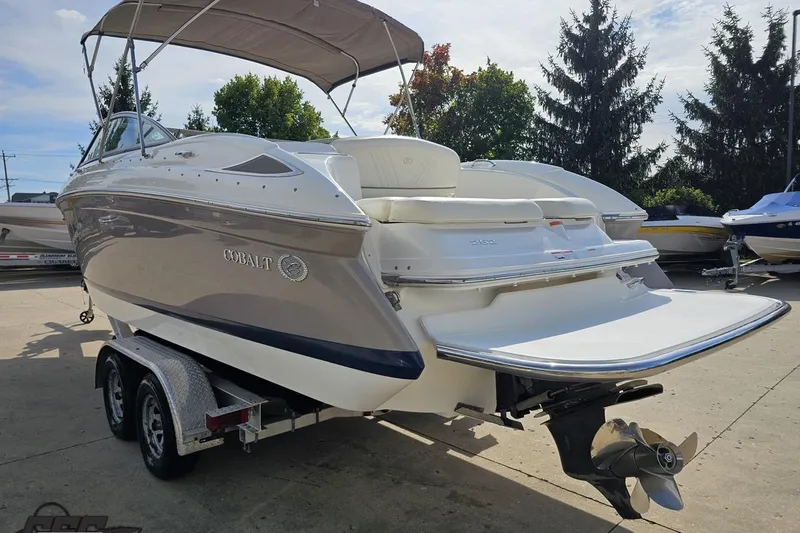 Slide: The Image of 2007 Cobalt 252 boat on trailer, featuring sleek design and spacious deck. - 27