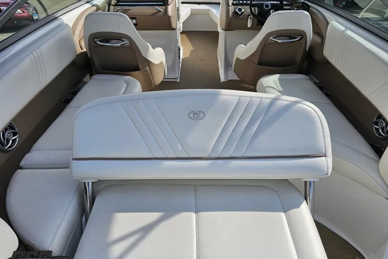 Slide: The Image of Interior of a 2007 Cobalt 252 boat with white and beige seating. - 40