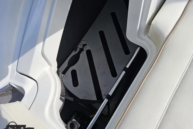 Slide: The Image of Storage compartment in a 2007 Cobalt 252 boat, featuring a sleek design. - 42