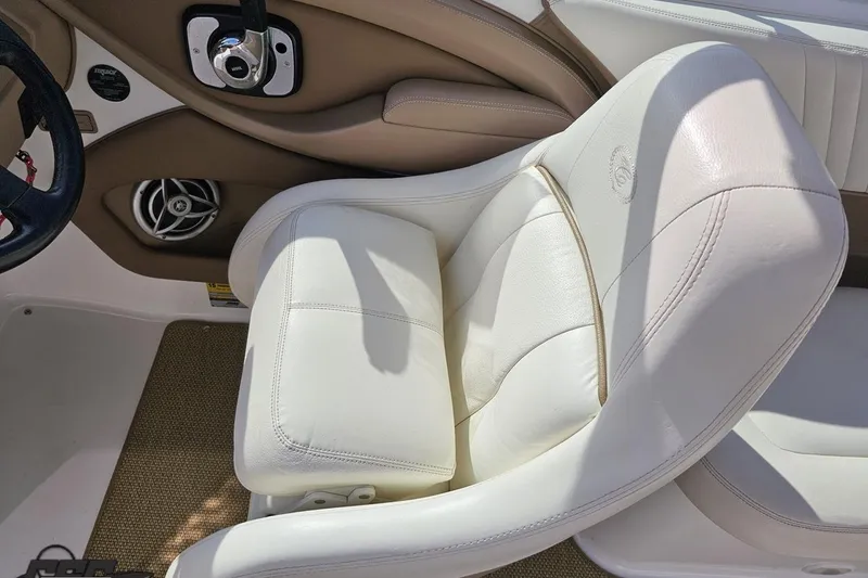 Slide: The Image of Luxurious white leather seat in a 2007 Cobalt 252 boat interior. - 61
