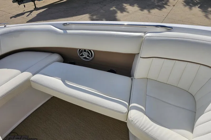 Slide: The Image of Luxurious white seating on a 2007 Cobalt 252 boat, featuring elegant design and comfort. - 74