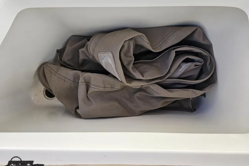 Slide: The Image of Gray jacket in a white sink, Cobalt 252, 2007 model. - 91