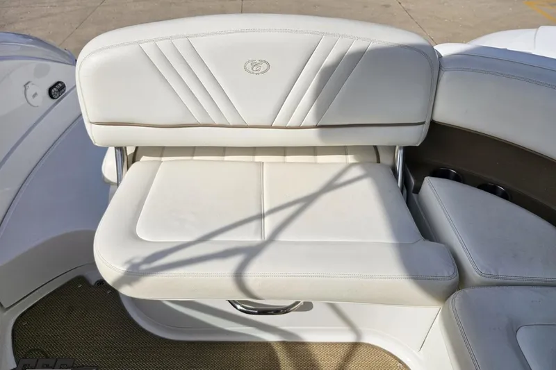Slide: The Image of White leather seating on a 2007 Cobalt 252 boat, featuring elegant stitching. - 92
