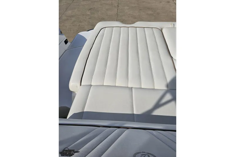 Slide: The Image of White leather seating on a 2007 Cobalt 252 boat, showcasing luxury and comfort. - 94