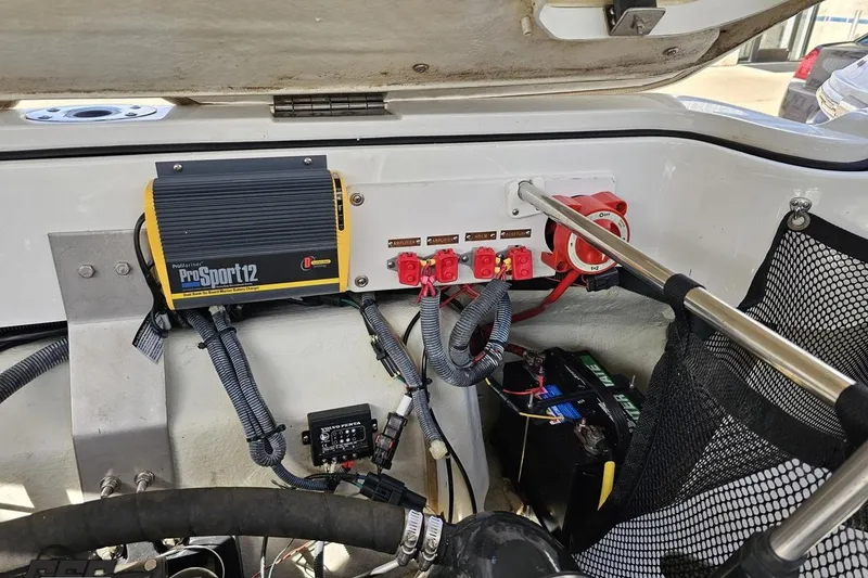 Slide: The Image of 2007 Cobalt 252 boat electrical system with ProSport12 charger and battery setup. - 98