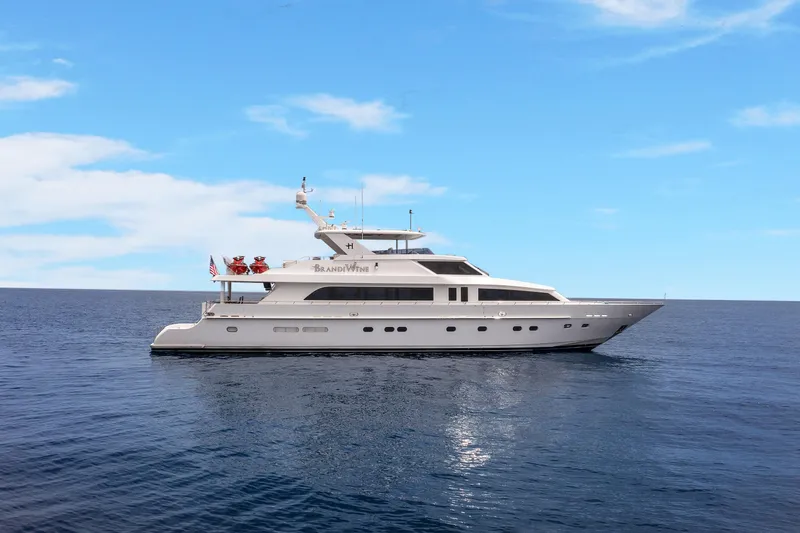 The Image of 2009 Hargrave Raised Pilothouse yacht on calm ocean under clear blue sky. - 1