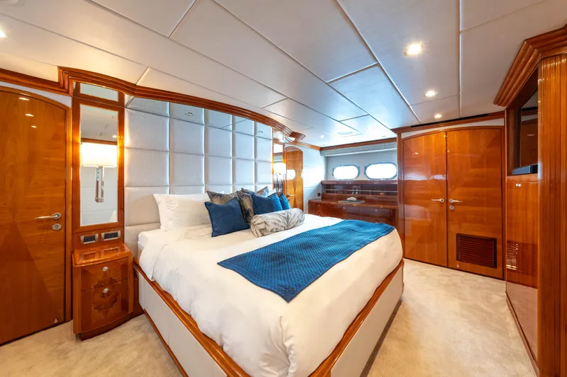 Slide: The Image of Luxurious bedroom interior of 2009 Hargrave Raised Pilothouse yacht with elegant wood finishes. - 11