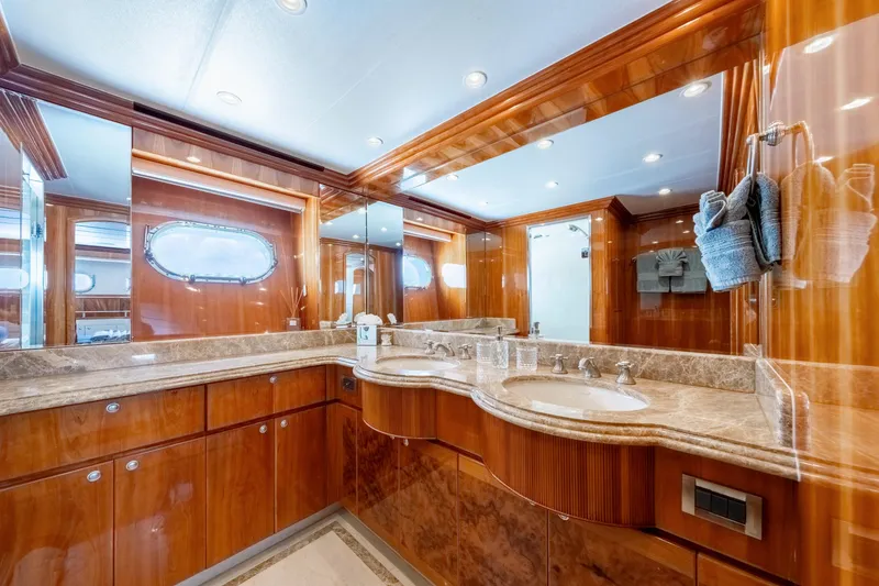 Slide: The Image of Luxurious bathroom in 2009 Hargrave Raised Pilothouse yacht with wood cabinetry and marble countertops. - 15