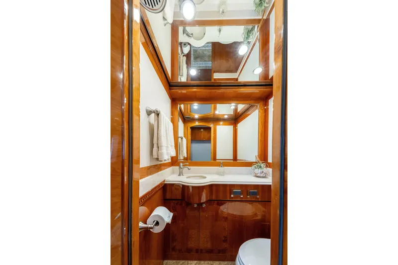 Slide: The Image of Luxurious 2009 Hargrave Raised Pilothouse yacht bathroom with wood accents and elegant fixtures. - 16