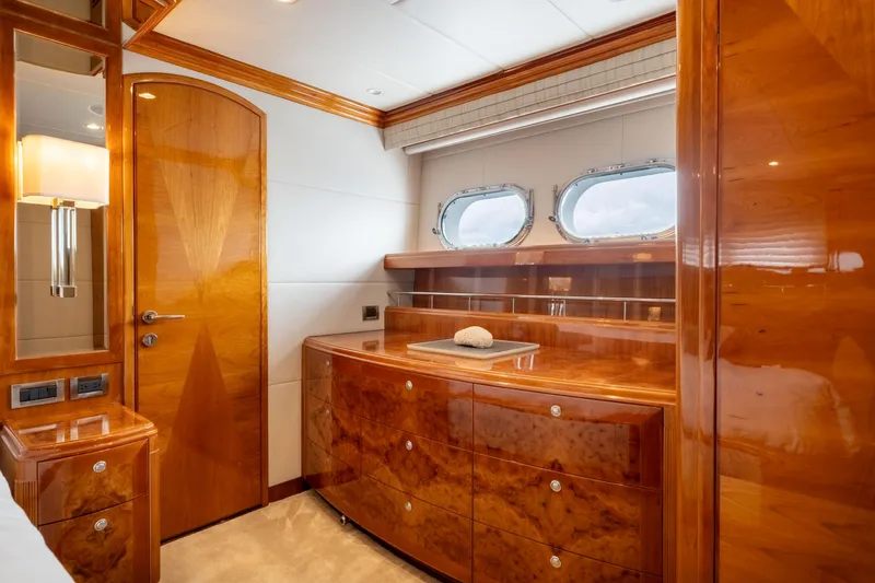 Slide: The Image of Luxurious wooden interior of 2009 Hargrave Raised Pilothouse yacht cabin with porthole windows. - 18