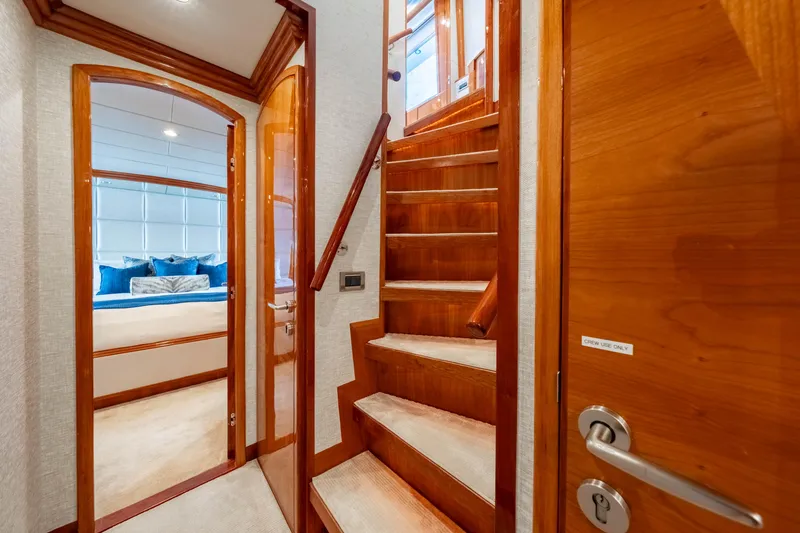 Slide: The Image of Luxurious interior of 2009 Hargrave Raised Pilothouse yacht with wooden stairs and bedroom. - 19
