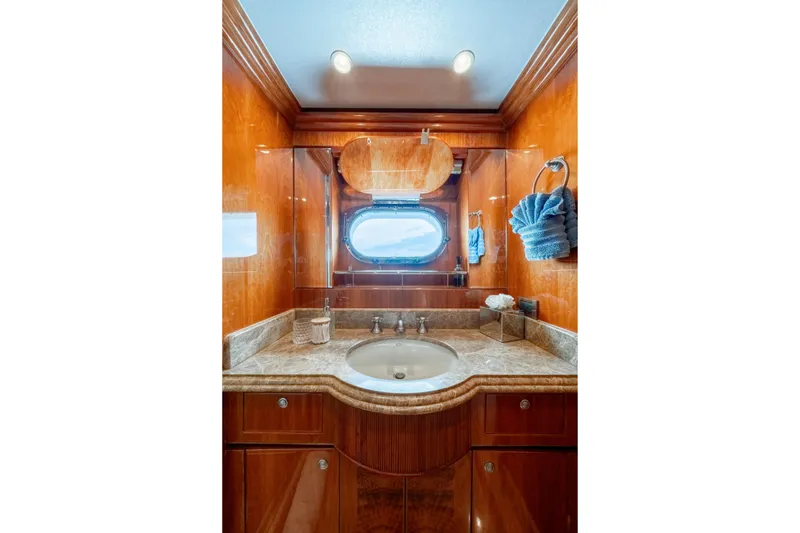 Slide: The Image of Luxurious 2009 Hargrave Raised Pilothouse yacht bathroom with wood paneling and marble countertop. - 21