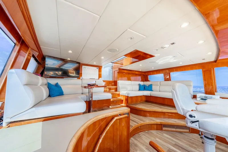 Slide: The Image of Luxurious 2009 Hargrave Raised Pilothouse yacht interior with plush seating and elegant wood finishes. - 23