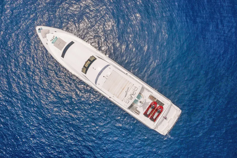 Slide: The Image of Aerial view of 2009 Hargrave Raised Pilothouse yacht on blue ocean water. - 34