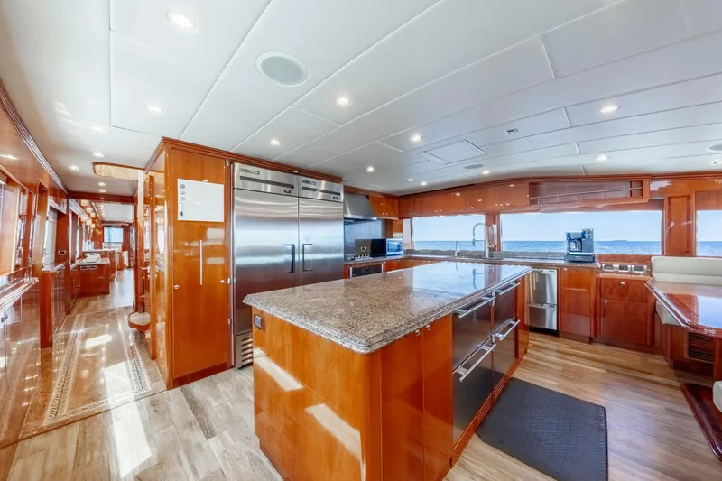 Slide: The Image of Luxurious 2009 Hargrave Raised Pilothouse yacht kitchen with modern appliances and ocean view. - 6