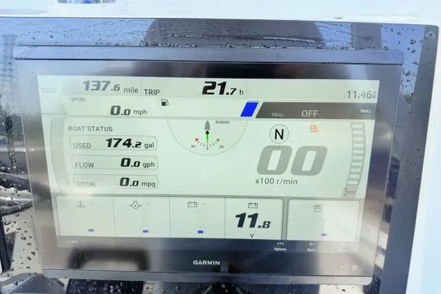 Slide: The Image of Yamaha display showing fuel usage and trip data for 2024 Tidewater 2700 Carolina Bay. - 14
