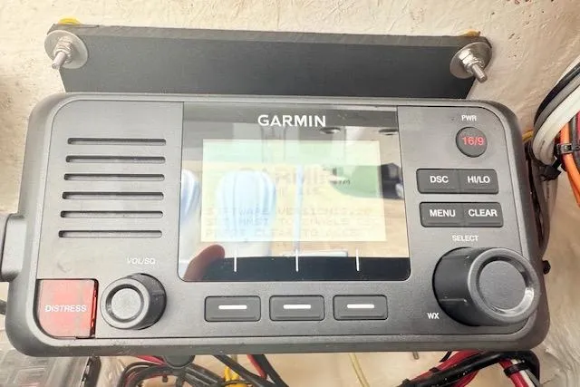 Slide: The Image of Garmin GPS display on 2024 Tidewater 2700 Carolina Bay boat, showing detailed navigation map. - 16