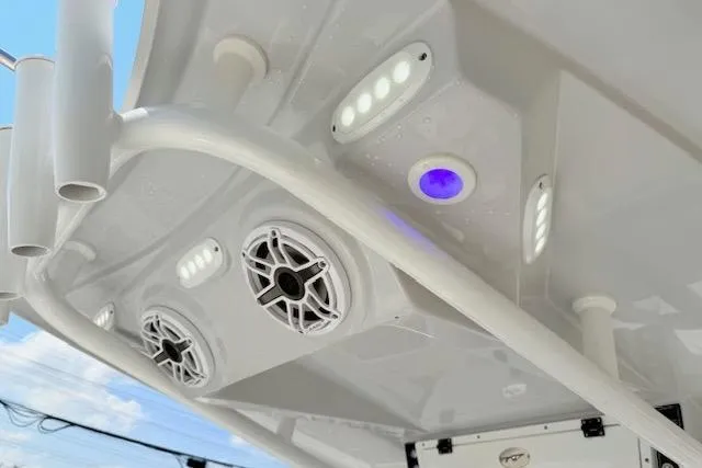 Slide: The Image of Garmin marine radio on 2024 Tidewater 2700 Carolina Bay boat dashboard. - 17