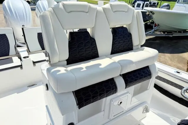 Slide: The Image of 2024 Tidewater 2700 Carolina Bay boat with luxurious dual seating and modern design. - 20