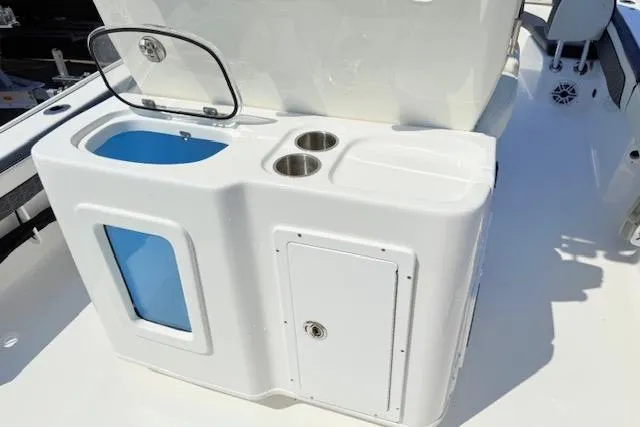 Slide: The Image of 2024 Tidewater 2700 Carolina Bay boat with dual engines and stylish seating. - 7