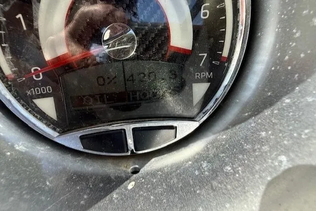 Slide: The Image of Close-up of 2019 Glastron GT 205 tachometer showing RPM and engine hours. - 11