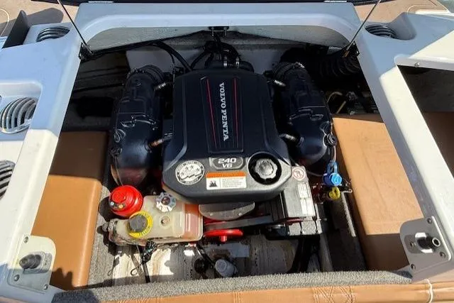 Slide: The Image of 2019 Glastron GT 205 boat engine compartment with Volvo Penta V6 engine. - 5