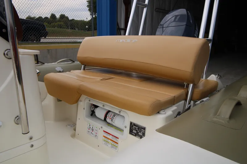 Slide: The Image of 2011 Zodiac Medline 550 NEO boat with Yamaha 90 horsepower engine, docked on concrete. - 10