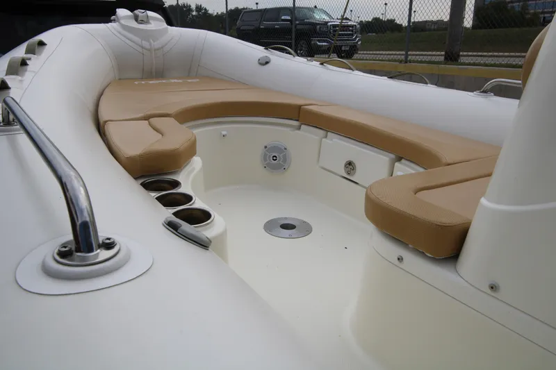Slide: The Image of 2011 Zodiac Medline 550 NEO boat on trailer, parked outdoors. - 12
