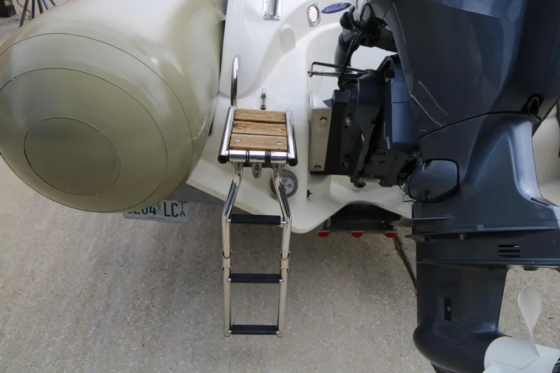 Slide: The Image of Cup holders in Zodiac Medline 550 NEO boat, 2011 model, with beige upholstery. - 18